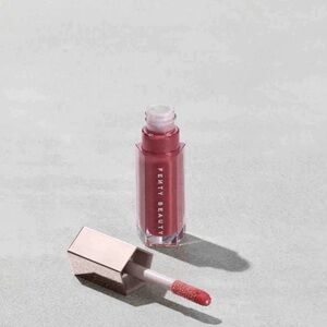 New in Box FENTY beauty GLOSS BOMB UNIVERSAL LIP LUMINIZER, color Riri